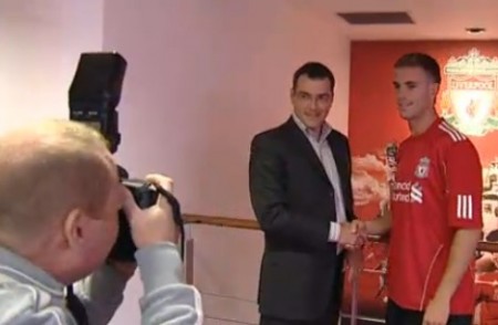 Henderson signs in at Anfield yesterday