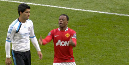 Patrice Evra and Luis Suarez