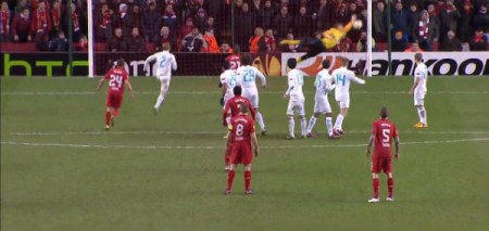 Luis Suarez scores a free kick against Zenit St Petersburg