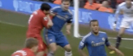 Luis Suarez bites Ivanovic