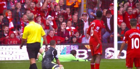 Sturridge watches his shot go into the bottom corner.