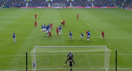 Suarez scores a free kick against Everton