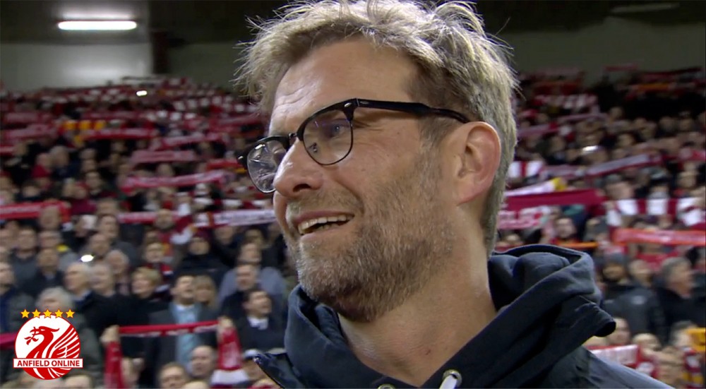 Jurgen Klopp watches on as the fans sing YNWA