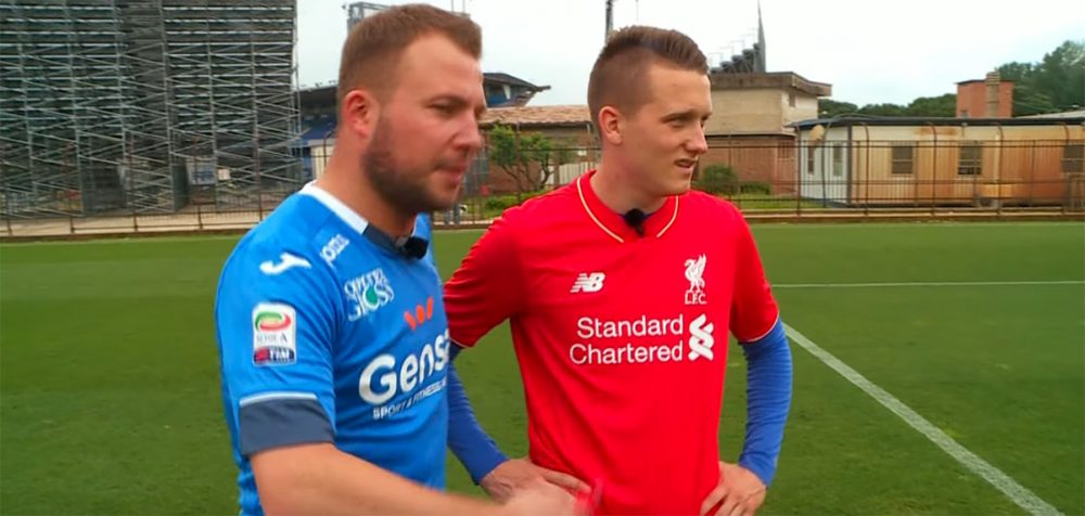 Piotr Zielinski wears a Liverpool shirt