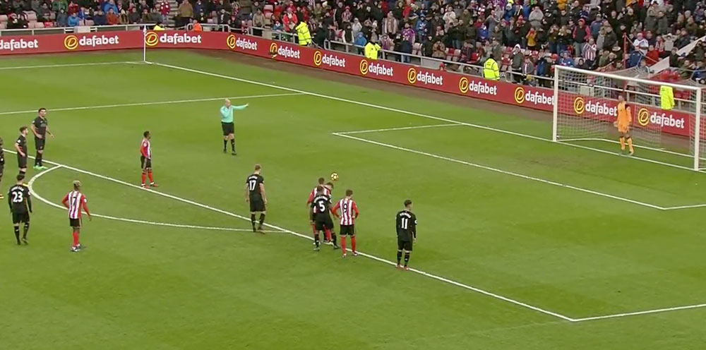 Defoe scores a penalty against Liverpool