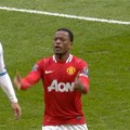 Patrice Evra and Luis Suarez