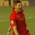 Steven Gerrard celebrates scoring penalty against Tottenham