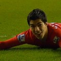 Luis Suarez completes his hat-trick against Wigan