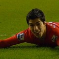Luis Suarez completes his hat-trick against Wigan