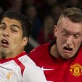 Suarez and Phil Jones exchange gurns