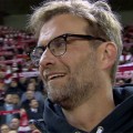 Jurgen Klopp watches on as the fans sing YNWA