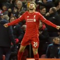 Adam Lallana scores against Man City