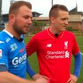 Piotr Zielinski wears a Liverpool shirt