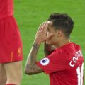 Coutinho sees a shot tipped wide by David De Gea