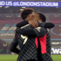 Firmino and Wijnaldum celebrate the third goal