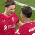 Tsimikas and Firmino celebrate against Benfica