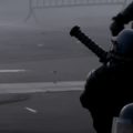 A militarised French police officer firest a tear-gas cannon at the Champions League Final