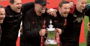 Jurgen Klopp and staff celebrate with the FA Cup