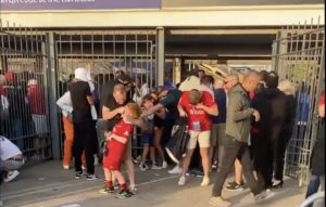 An LFC supporting child is tear-gassed by French police