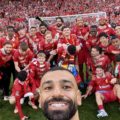 Salah takes a selfie of the 2024/25 LFC champions team